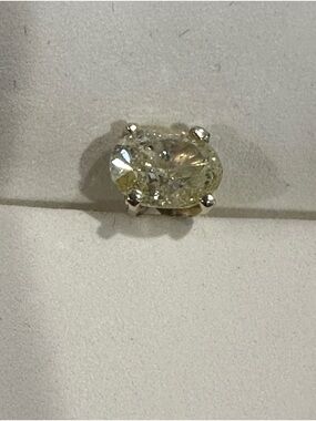 Fancy Diamond - 1.50 ct. Fancy Brownish Yellow, Natural Even, SI2 Oval